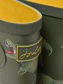 Joules JNR WELLY PRINT Boys Wellies Green Dino detail view of rubber boot with dinosaur design and iconic logo