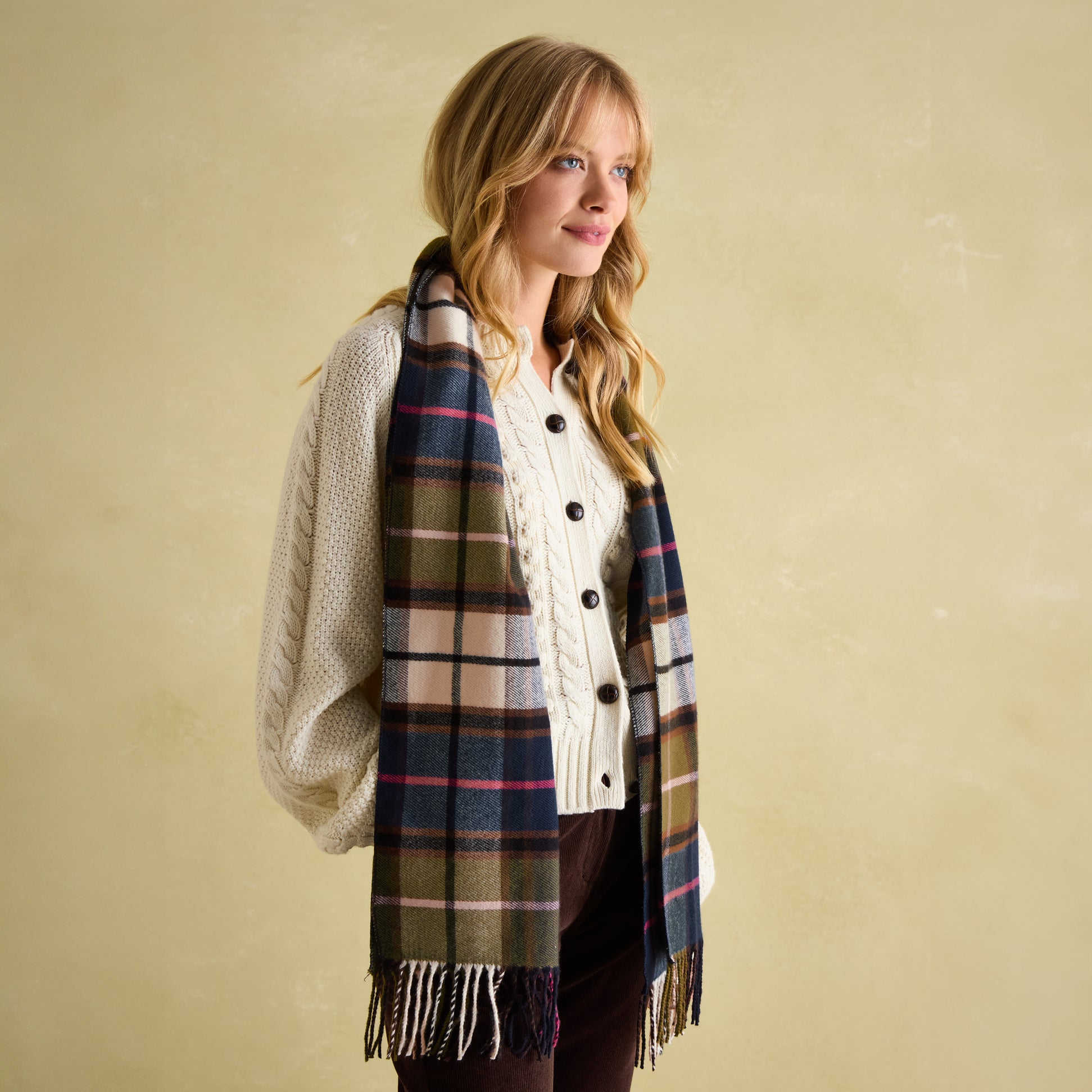 Joules LANGTREE Womens Scarf Green Pink Check draped side view model displaying comfort and style.