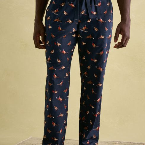 Joules DOZER Pyjama Bottoms Game Birds front view, featuring a navy background with colorful game bird prints.