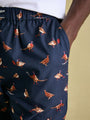 Joules DOZER Pyjama Bottoms Game Birds side view showing vibrant game bird print and elasticated waist.