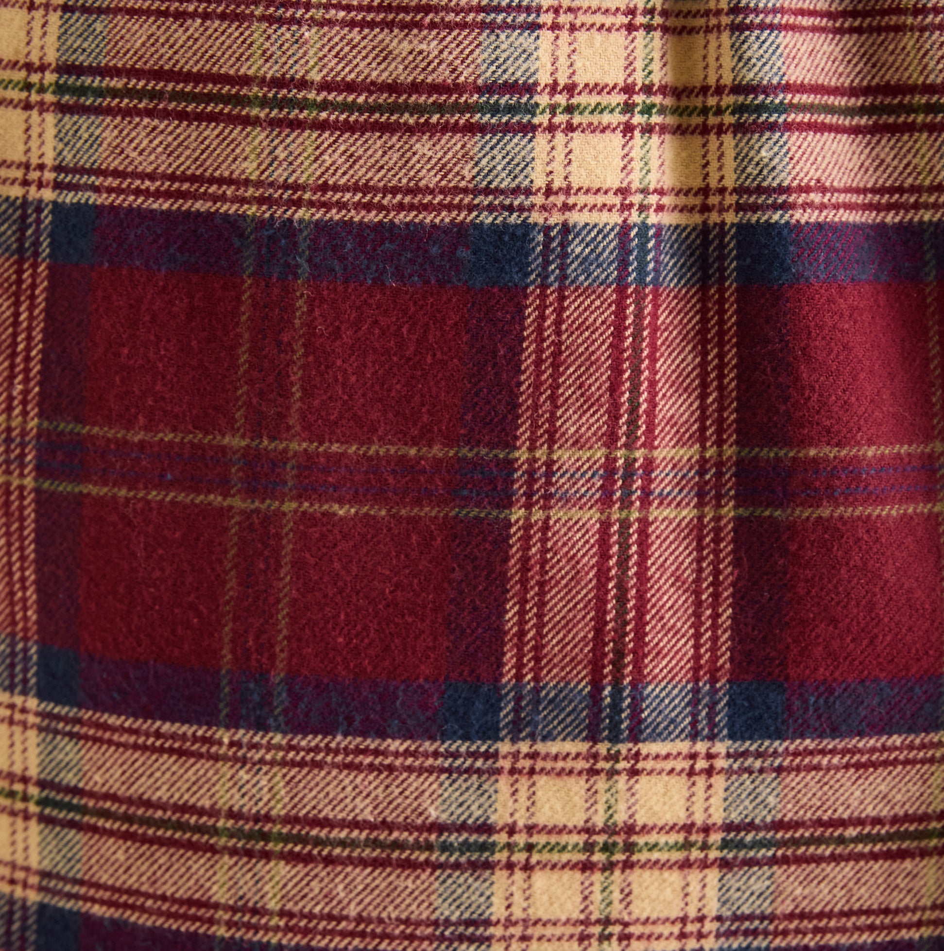 Joules SLEEPER Mens Pyjama Bottoms Red Check detail view of checked fabric pattern in red and cream.