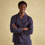 Joules HUGO Mens Pyjama Set Navy Stripe front view on model smiling, showcasing striped design and single chest pocket.