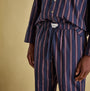 Joules HUGO Mens Pyjama Set Navy Stripe detail view, featuring elasticated waist and branded tab.