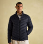 Joules GARRETT Mens Jacket Navy front view on model, features padded design and chevron quilting.
