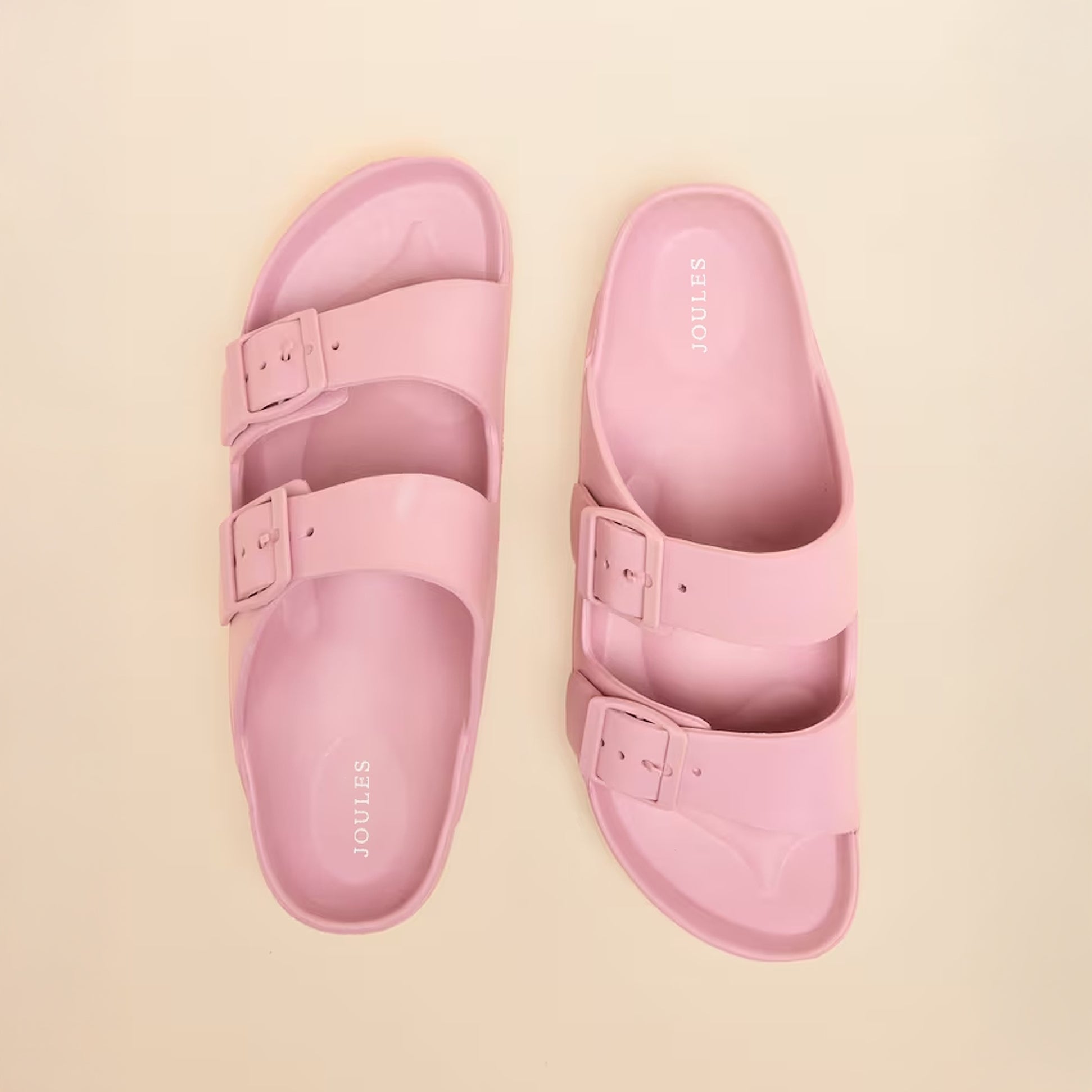 Joules SUNSEEKER Womens Sliders Pink top view showcasing dual buckle design on lightweight EVA material.