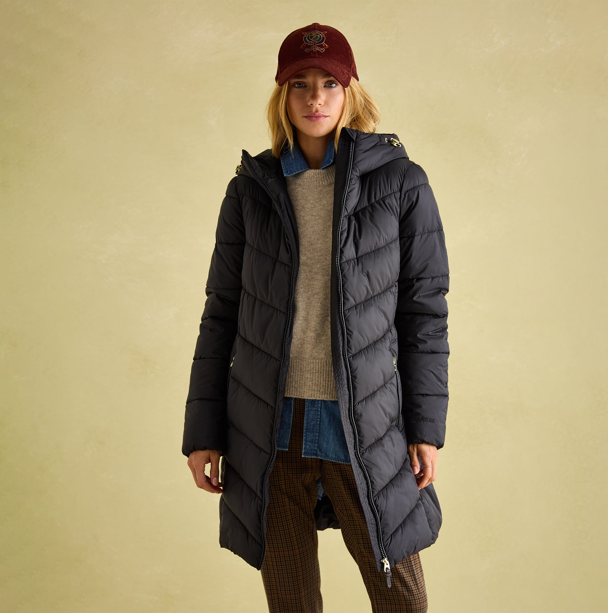 Joules MOORSDALE Womens Mid Length Showerproof Padded Coat with Hood Black front view, showcasing stylish design and warm padding.