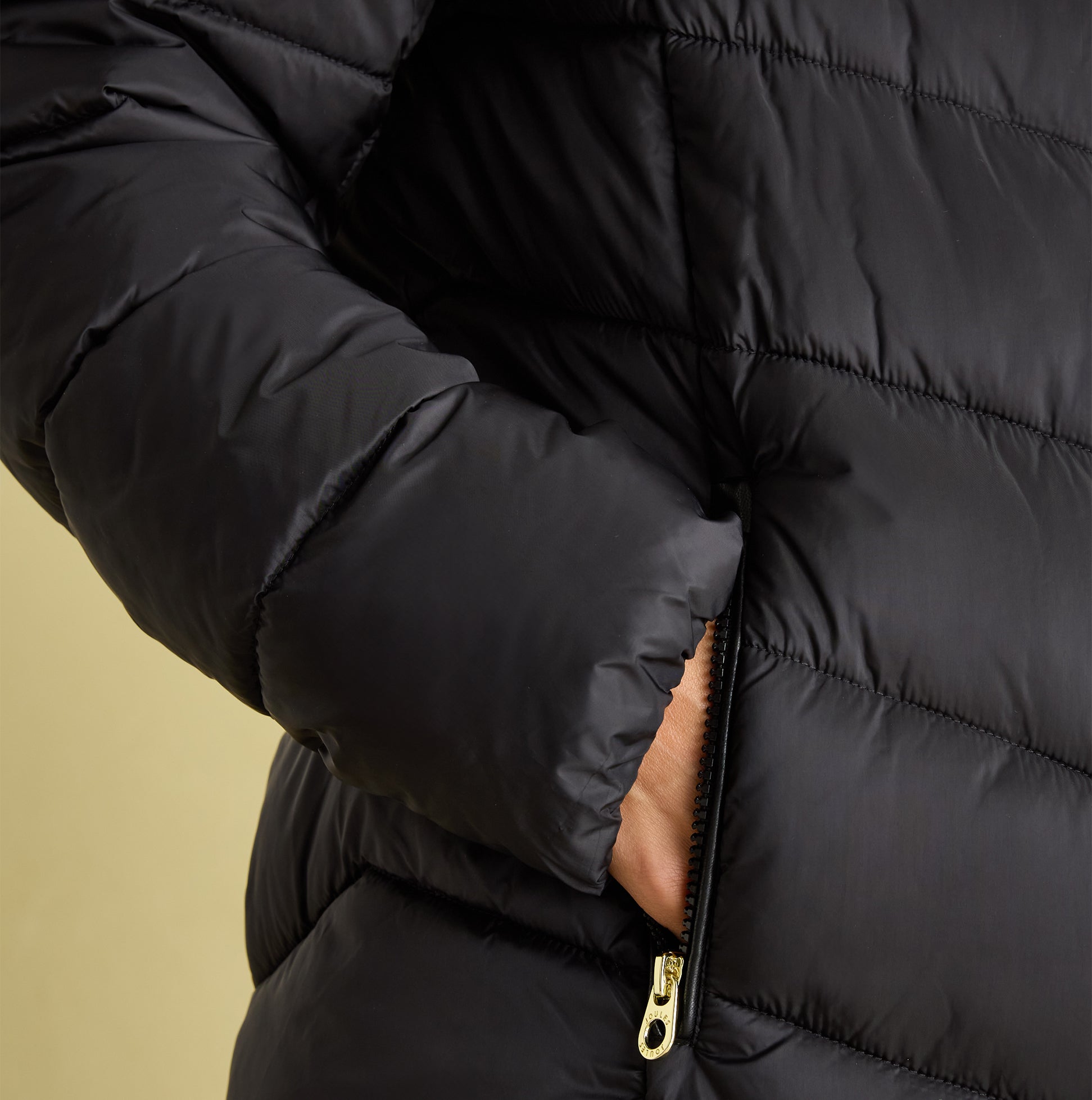 Joules MOORSDALE Womens Mid Length Showerproof Padded Coat with Hood Black detail view of sleeve and pocket