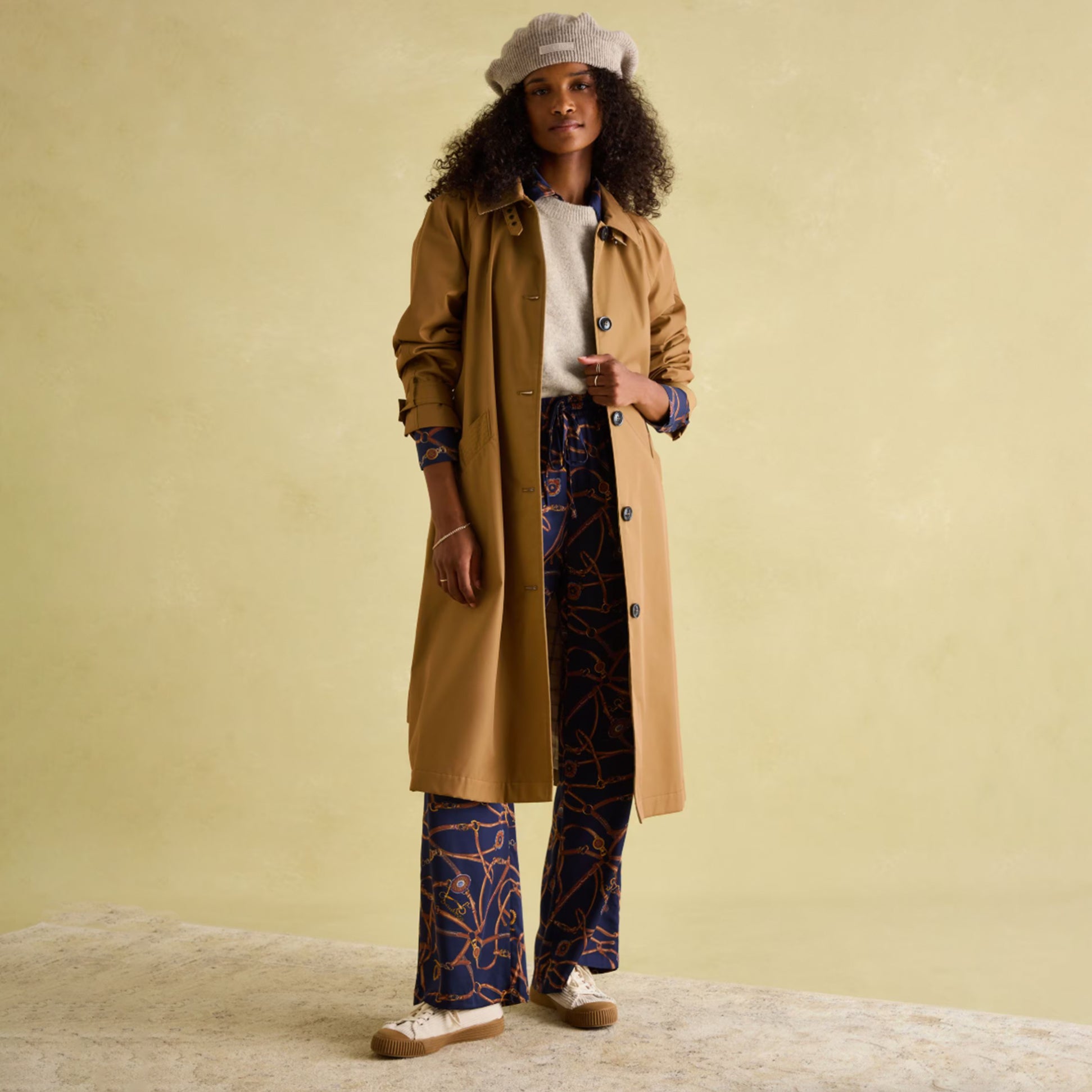Joules Epwell Womens Waterproof Belted Trench Coat Brown front view worn by model, showing stylish longline design and button closure.