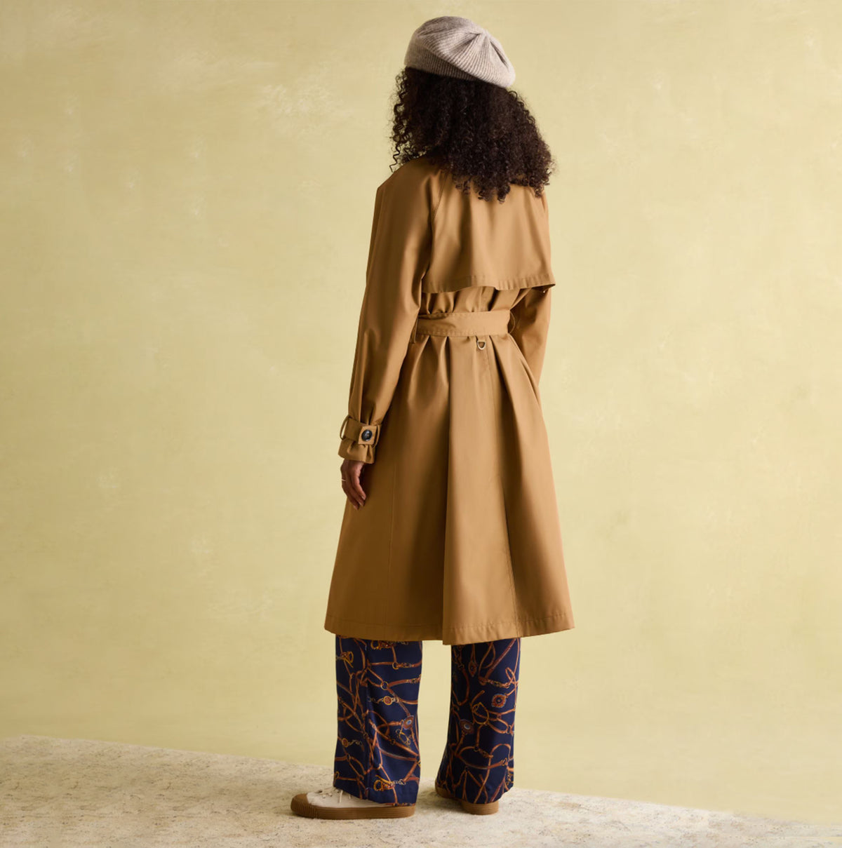 Joules Epwell Womens Waterproof Belted Trench Coat Brown back view on model, showcasing longline design and belted waist.