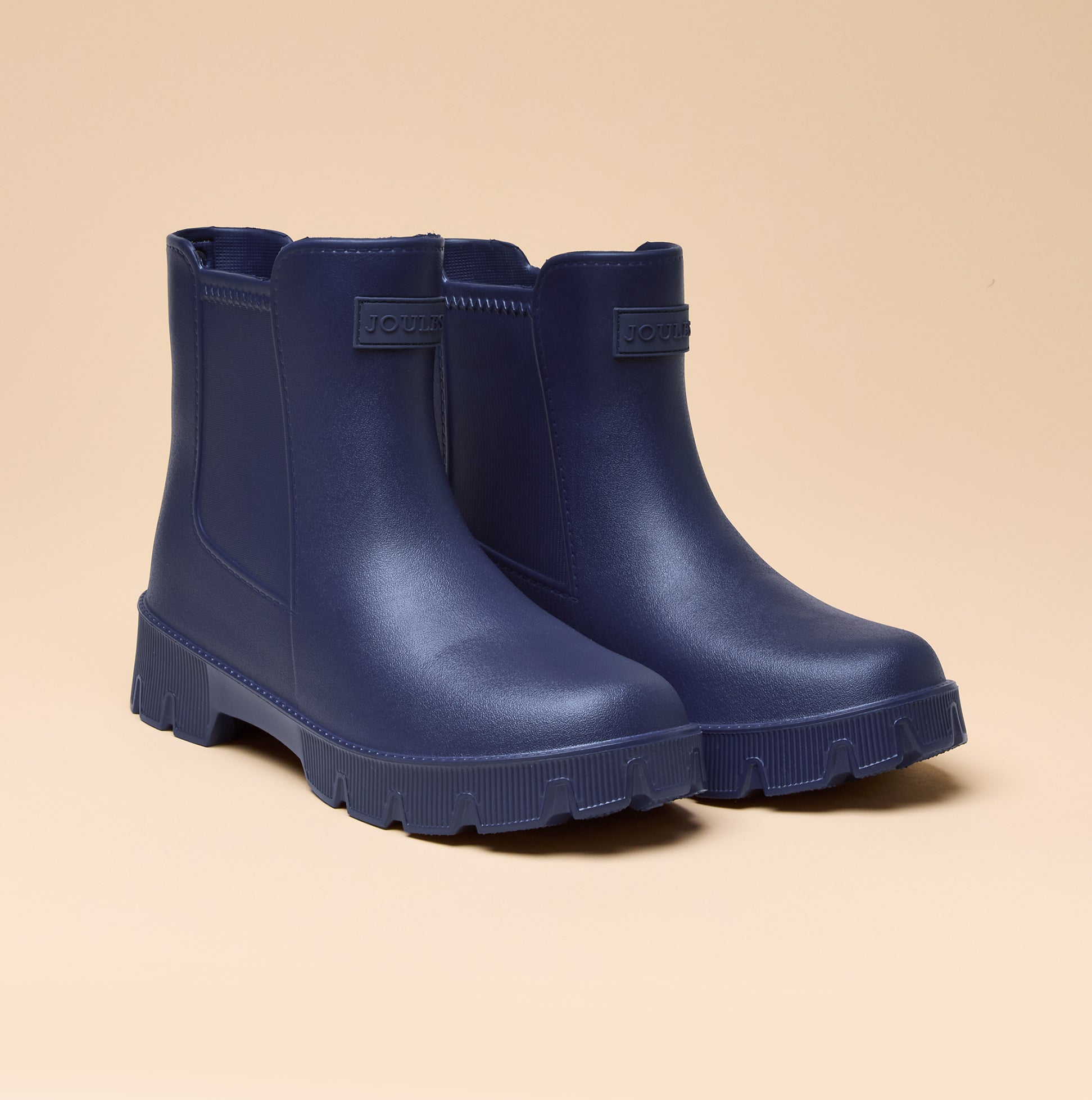 Joules RAINDANCE Lightweight Wellies Navy front view showcasing waterproof ankle boots with round toe and pull-on design.