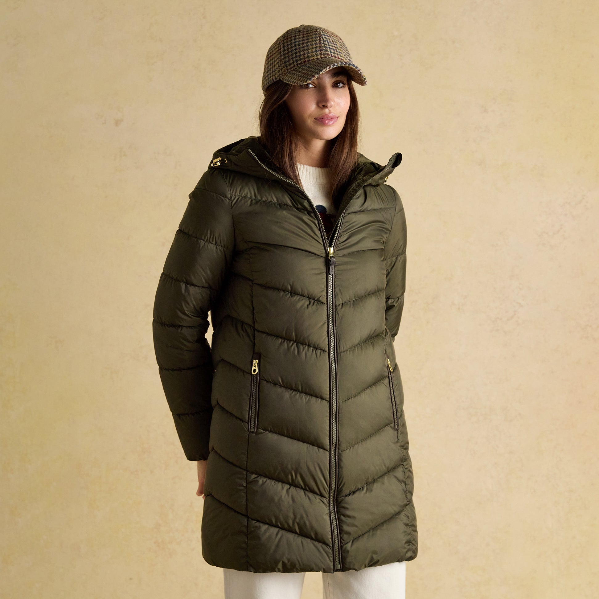 Joules MOORSDALE Womens Mid Length Showerproof Padded Coat with Hood Khaki front view model wearing a stylish coat