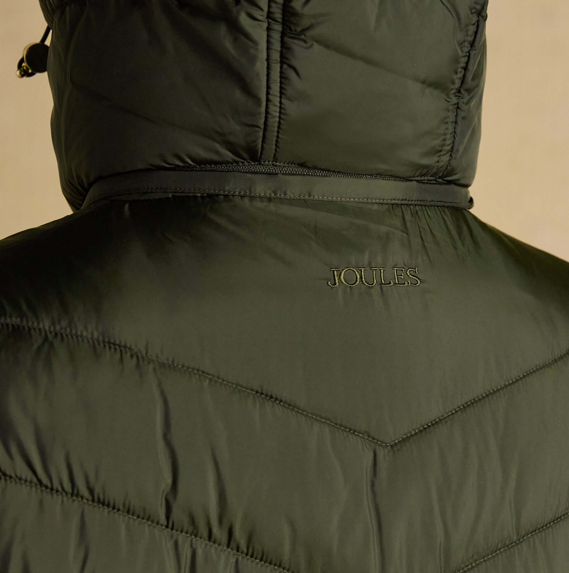 Joules PEMBURY Showerproof Longline Padded Coat with Hood Khaki back view showing logo detail.