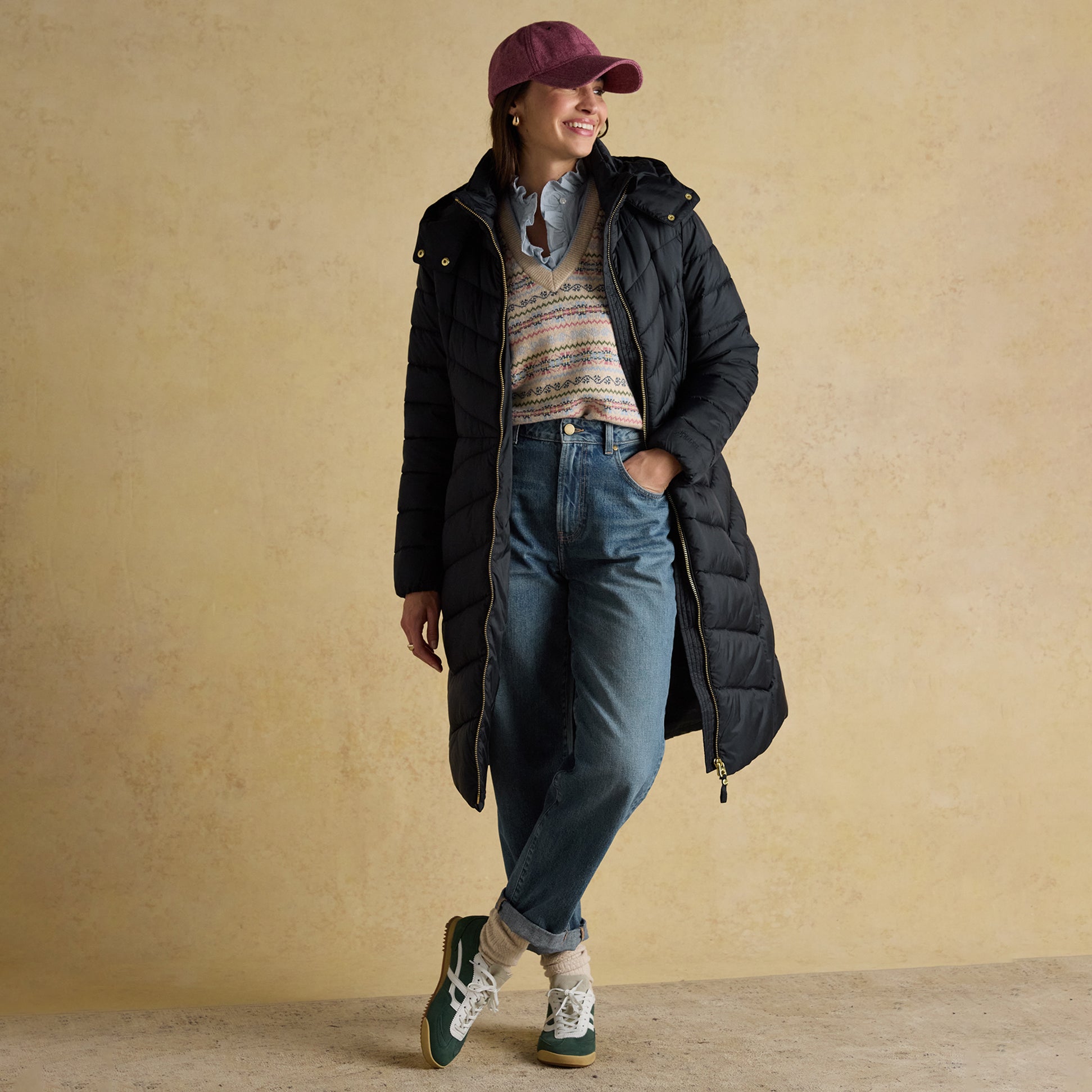 Joules PEMBURY Womens Long Coat Navy front view worn by a smiling model with jeans and a cap.