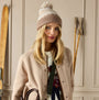 Joules KARA BOBBLE Womens Bobble Neutral front view of a model wearing a beanie hat with a pom-pom.