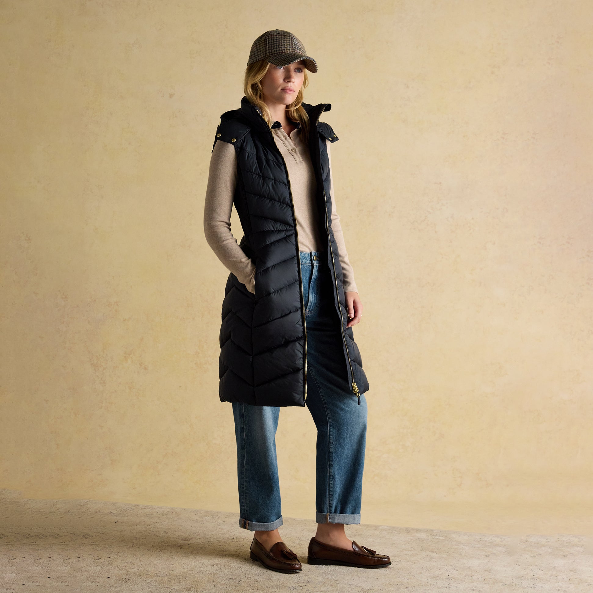 Joules PEMBURY Longline Showerproof Padded Gilet with Hood Navy front view on model, highlighting style and design.