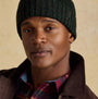 Joules HAMMOND Mens Beanie Green worn by a model, close-up front view, showing texture and color.