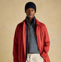 Joules HAMMOND Mens Beanie Navy worn by model in front view, styled with red coat and plaid shirt.