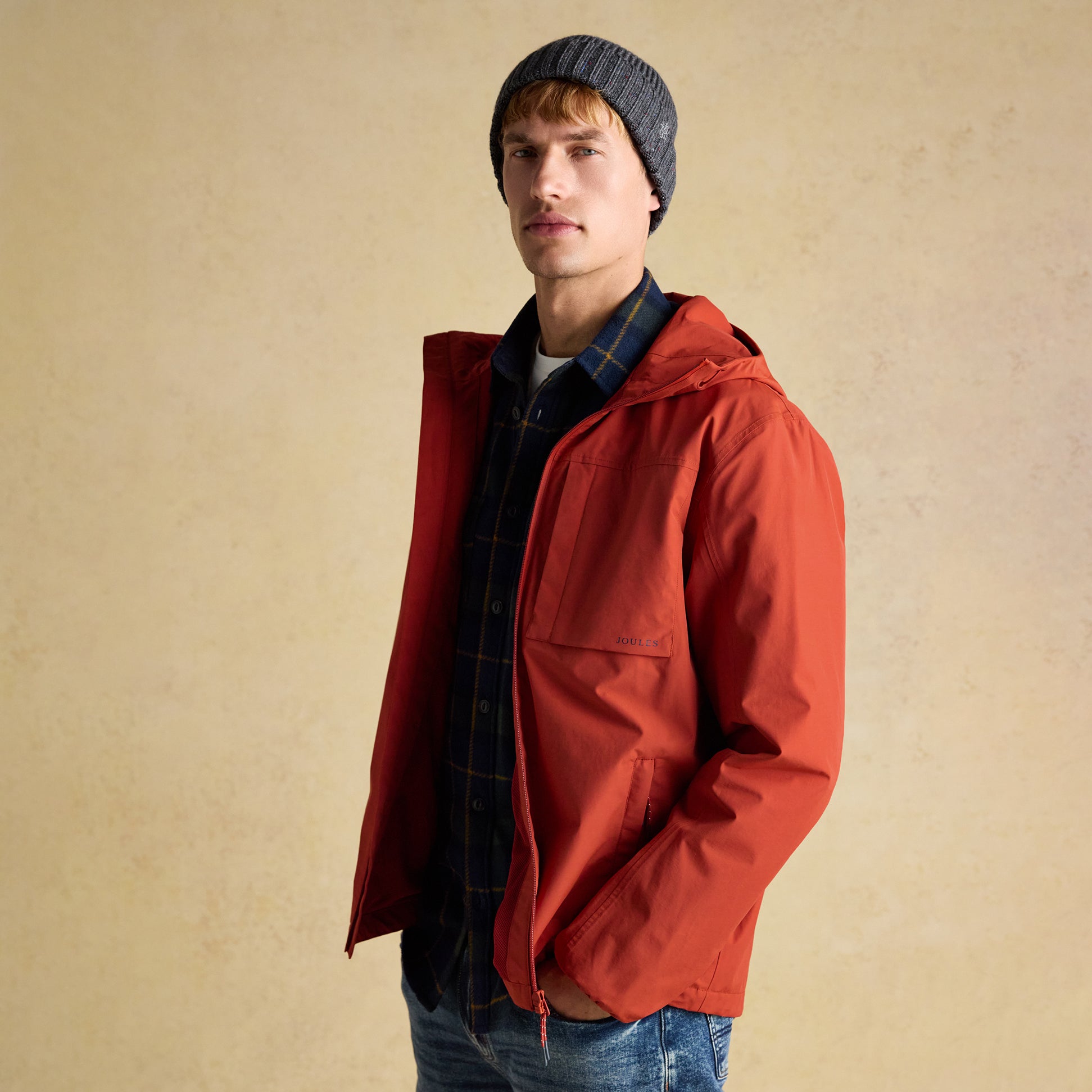 Joules HAMMOND Mens Beanie Grey side view worn by model with red jacket and plaid shirt