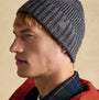 Joules HAMMOND Mens Beanie Grey side view worn by model, showcasing ribbed texture and logo detail.