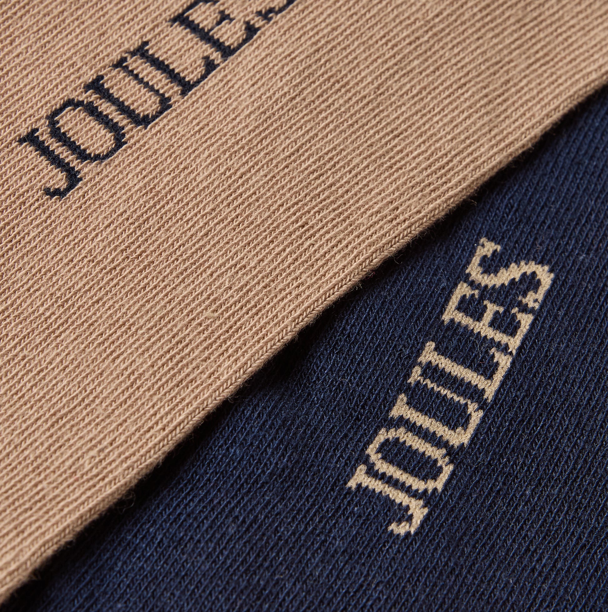 Joules KINGSBURY Mens Socks Navy/Oatmeal detail view of fabric, featuring logo on cotton blend.