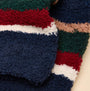 Joules FLUFFY Mens Socks Navy detail view showing the soft, fluffy texture and multi-color stripes against a neutral background.