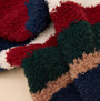 Joules FLUFFY Mens Socks Navy detail view showcasing soft texture and vibrant colors including navy, red, green, and cream.