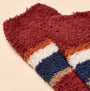 Joules FLUFFY Mens Socks Red close-up view showcasing soft material and colorful striped design.