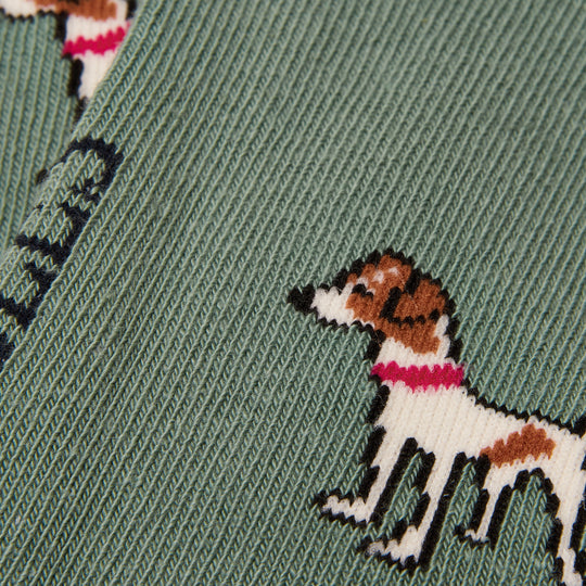 Detail view of Joules EVERYDAY Womens Socks Green/Blue featuring playful dog design on a green background.