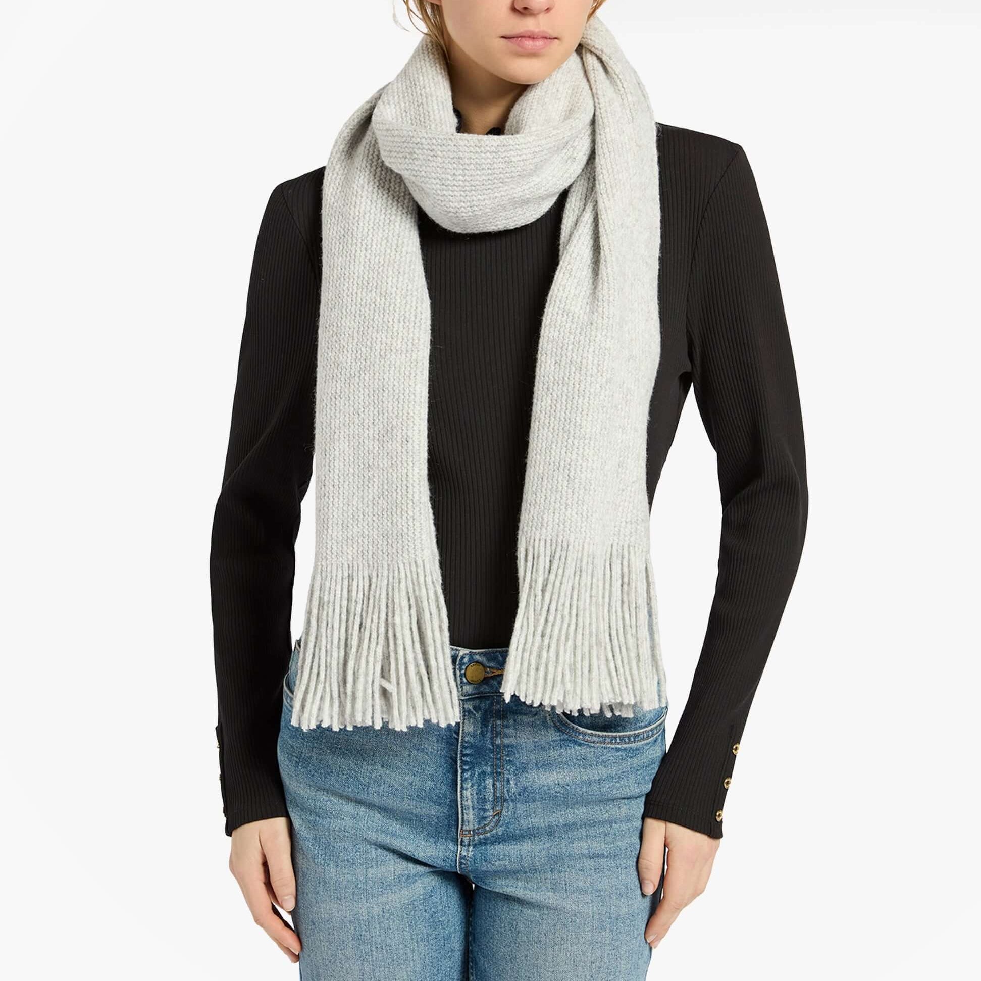 Joules ROSA Womens Winter Grey front view of a light grey scarf worn with a black top and jeans.