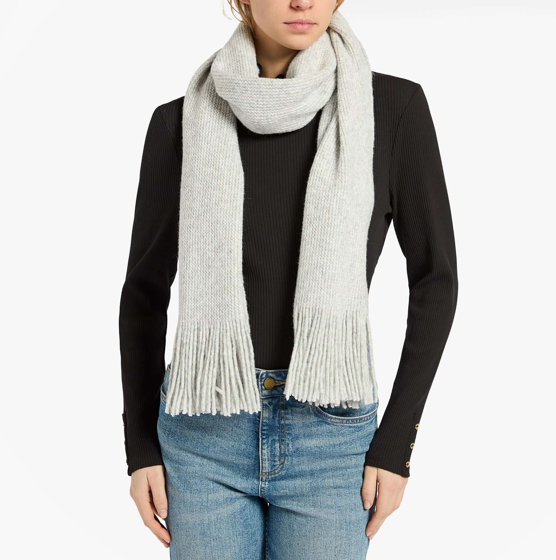 Joules ROSA Womens Winter Grey front view of a light grey scarf worn with a black top and jeans.
