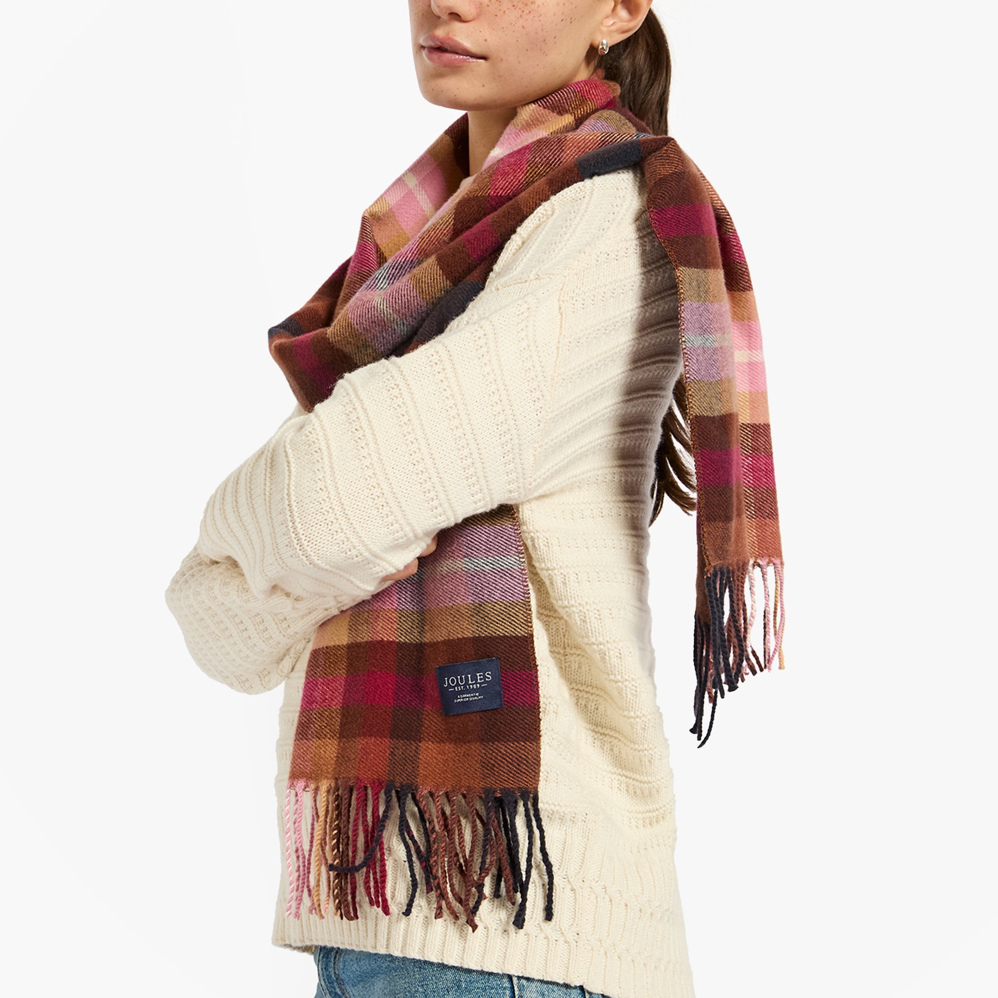 Joules LANGTREE Womens Winter Berry Red front view, cozy scarf wrapped around a sweater, showcasing warm hues and tassels.