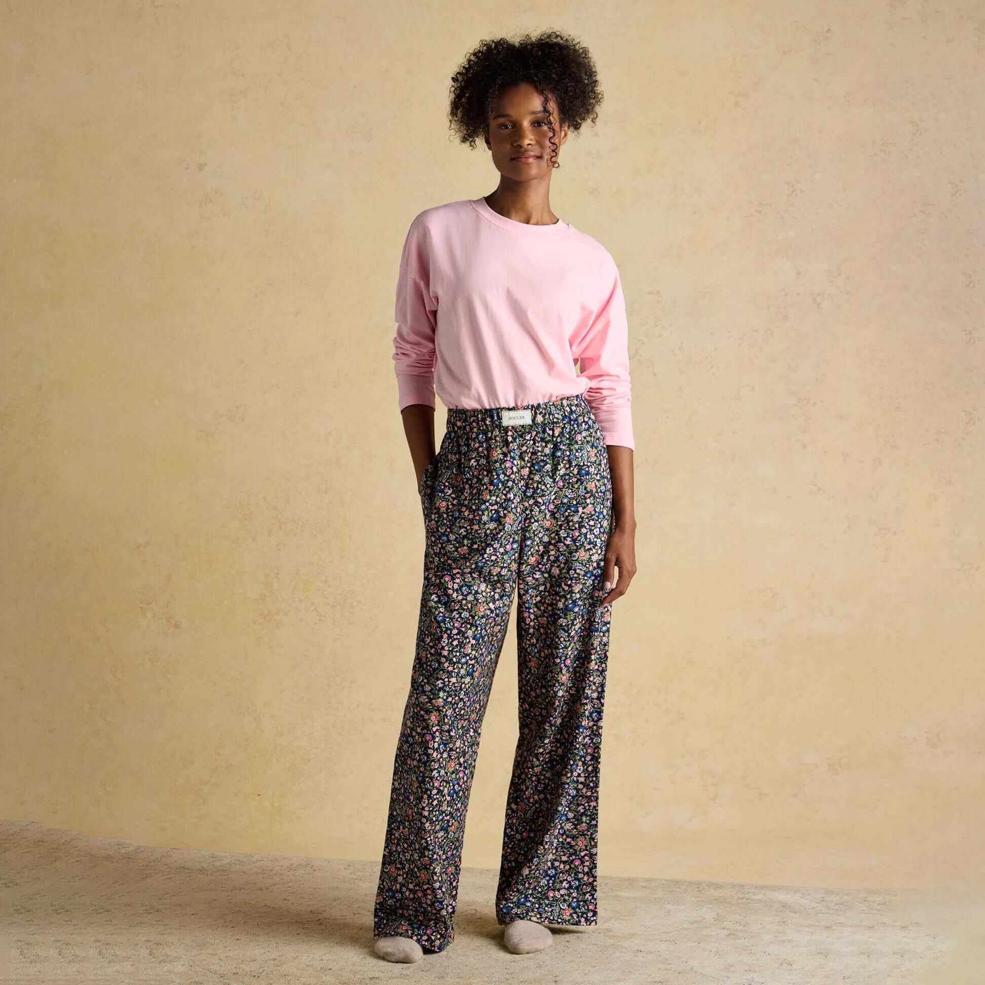 Joules STELLA Womens Pyjama Bottoms Navy/Pink front view, relaxed fit, floral design with long sleeves.