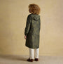 Joules HOLKHAM Waterproof Packable Raincoat With Hood Green back view with hood up on model, showcasing relaxed fit and recycled material.