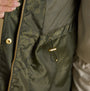 Joules HOLKHAM Waterproof Packable Raincoat With Hood Green interior detail view showing mesh lining and adjustable toggle.