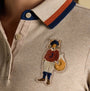 Joules FAIRFIELD JONTY Womens Polo Shirt Neutral detail view showcasing embroidered fox design on collar.
