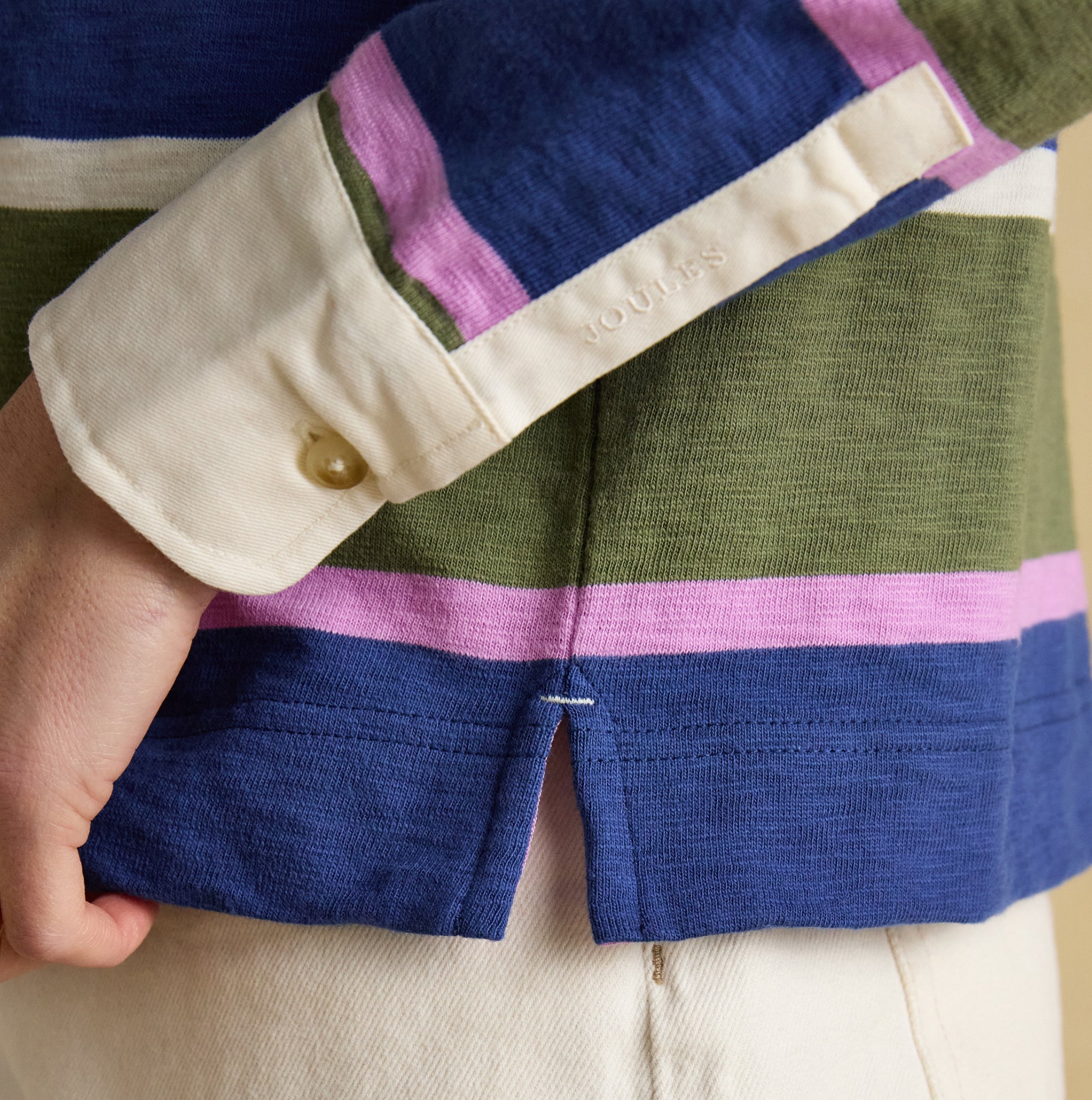 Joules LARA SLUB Womens Rugby Shirt Green detail view showcasing functional button cuffs and side split.