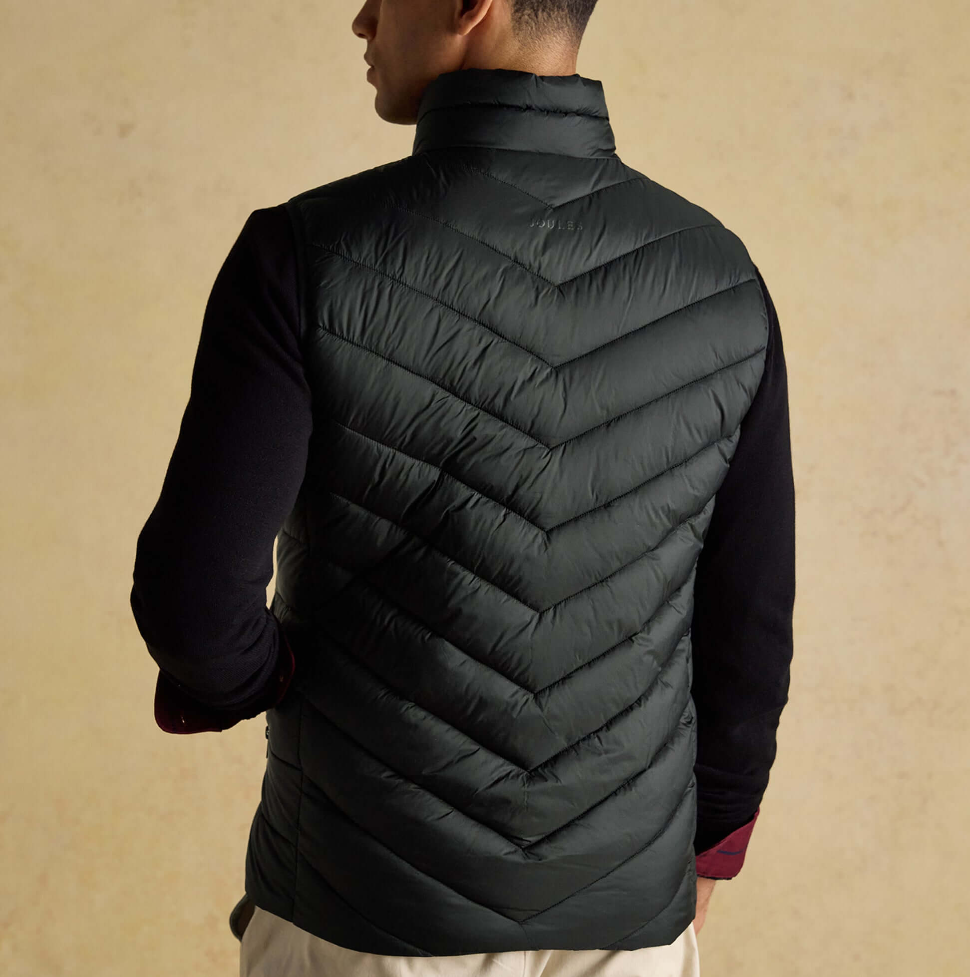 Joules GARRETT Mens Showerproof Padded Gilet Black back view showing chevron design and padding details.