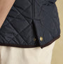 Joules MAYNARD Mens Gilet Navy detail view showcasing the quilted fabric and fastening detail.