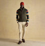 Joules HERITAGE FLEECE Mens Gilet Green front view on model with hat and striped sweater