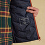 Joules GARRETT Mens Showerproof Padded Gilet Orange detail view of the inner label and lining.