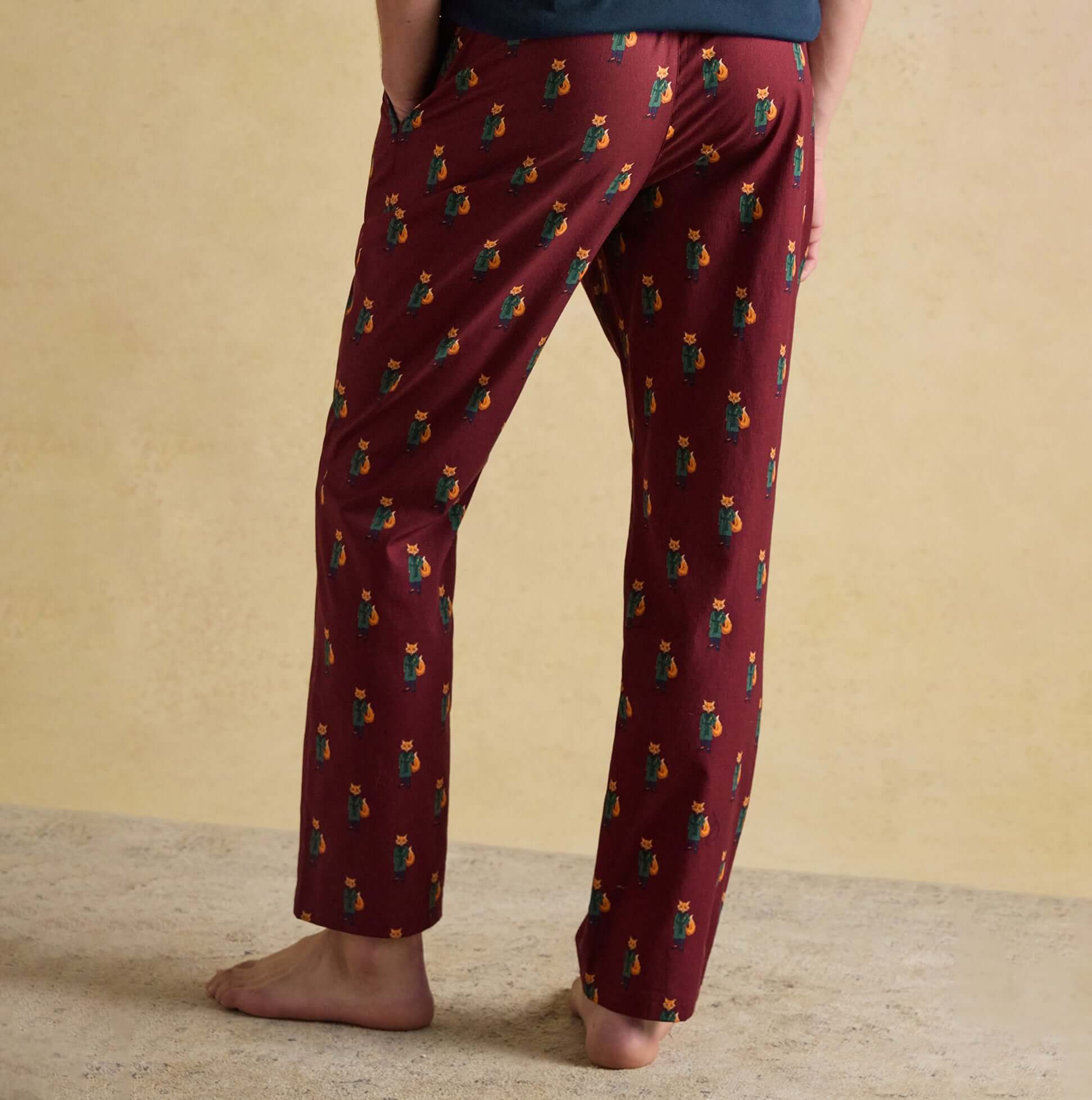 Joules DOZER Mens Pyjama Trousers Burgundy Red back view, featuring colorful pattern and relaxed fit, made of 100% cotton.