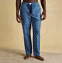 Joules DOZER Mens Pyjama Bottoms Blue front view on model showcasing relaxed fit and cotton material.