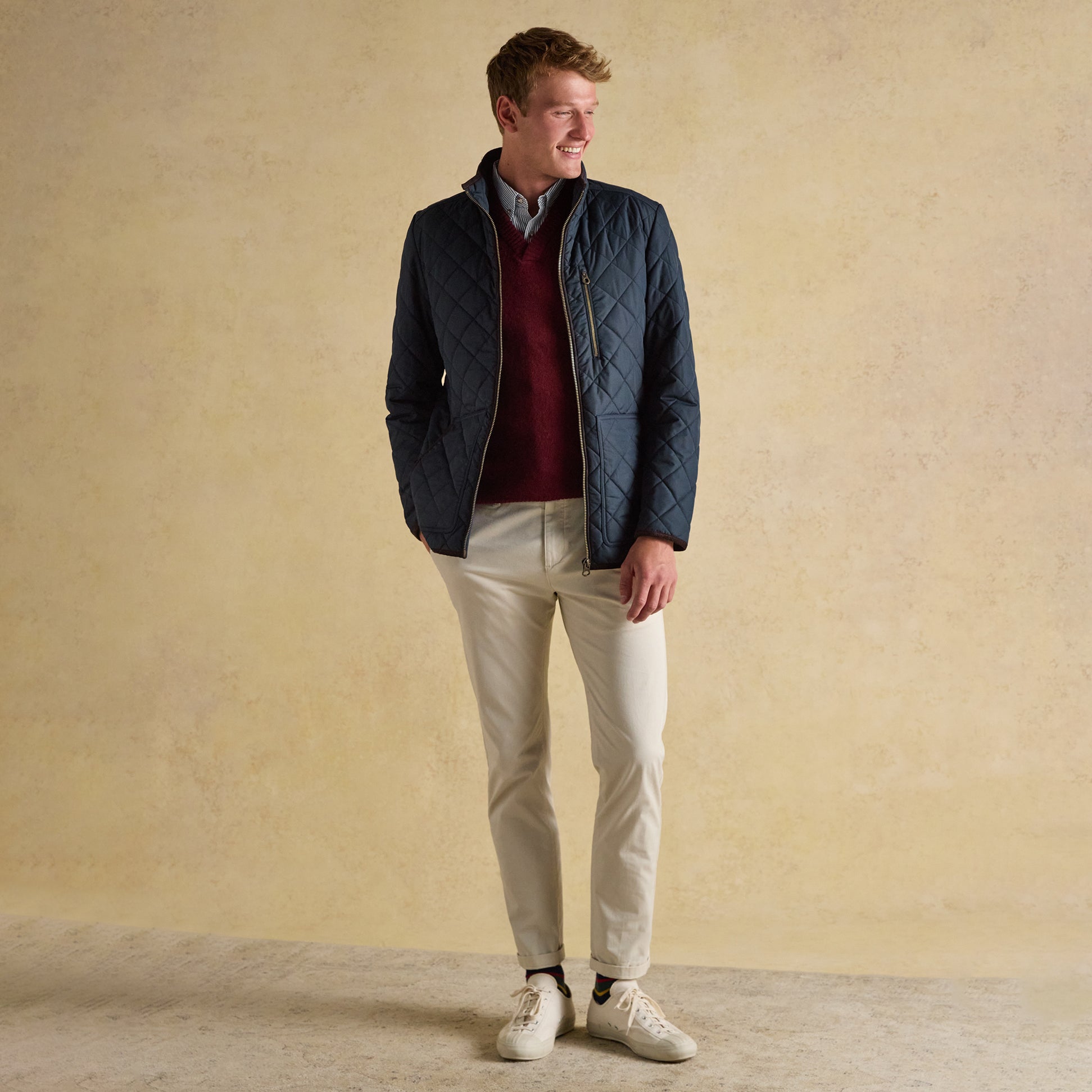 Joules MAYNARD Mens Jacket Navy front view worn by model with zip closure, paired with light trousers and white sneakers.