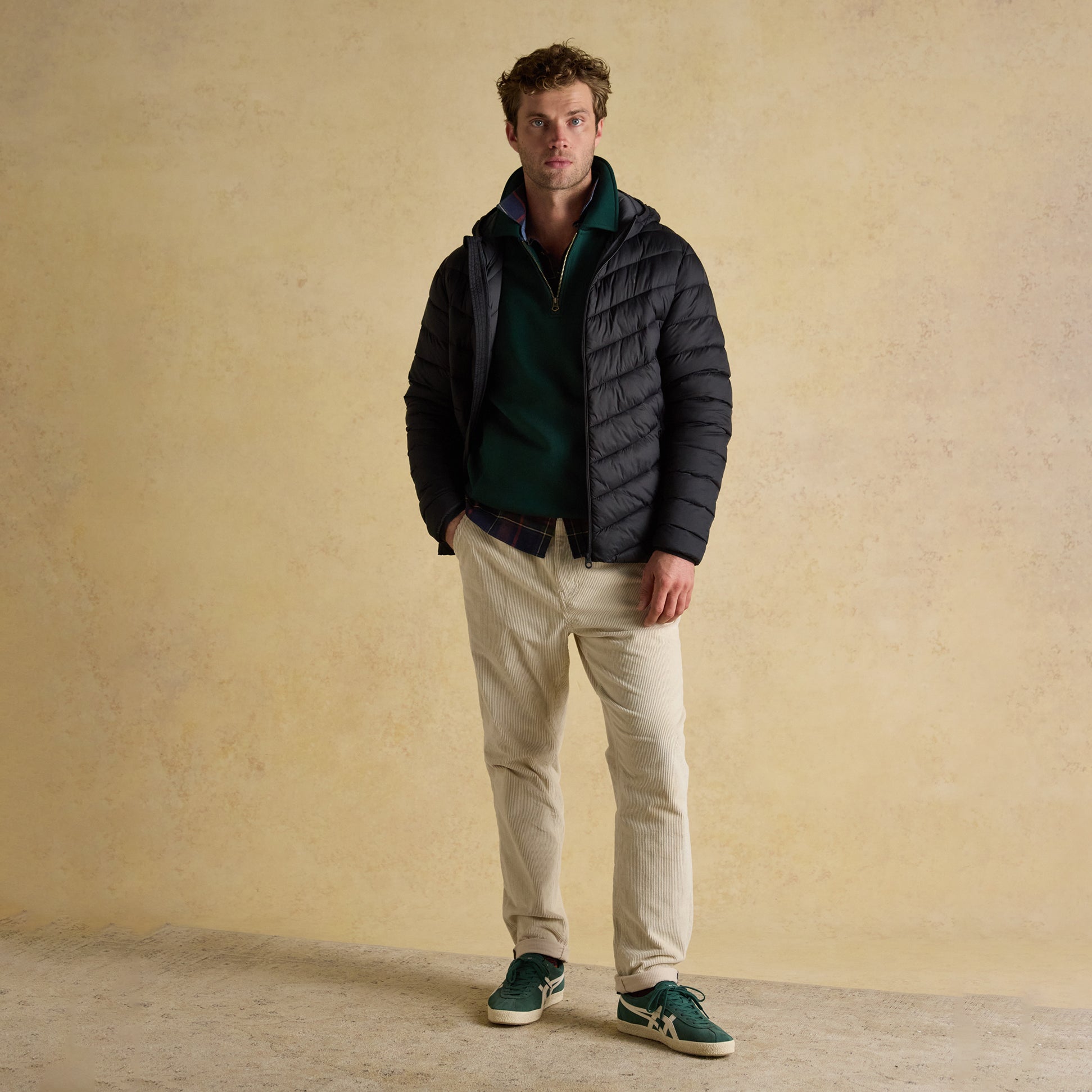 Joules GARRETT Mens Showerproof Padded Jacket Black front view on model featuring zip closure and comfortable fit.