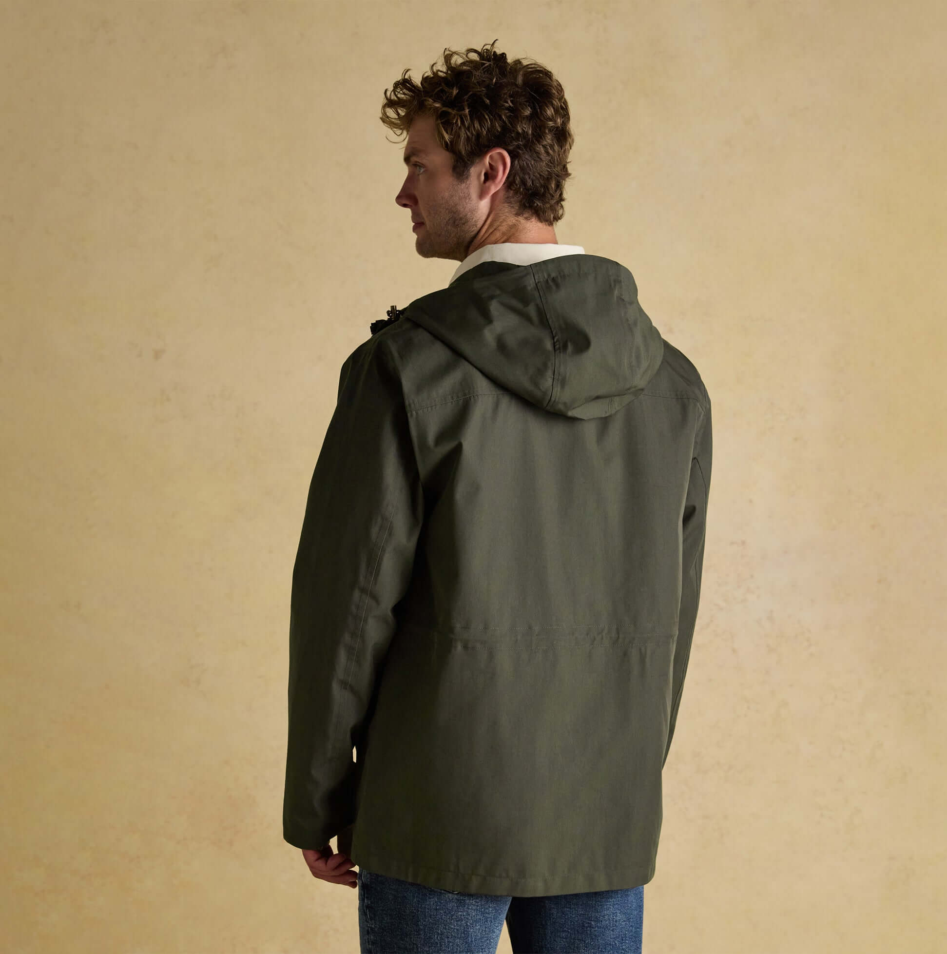 Joules PORTMAN Mens Green Waterproof Raincoat Green back view showcasing the hood and material details.