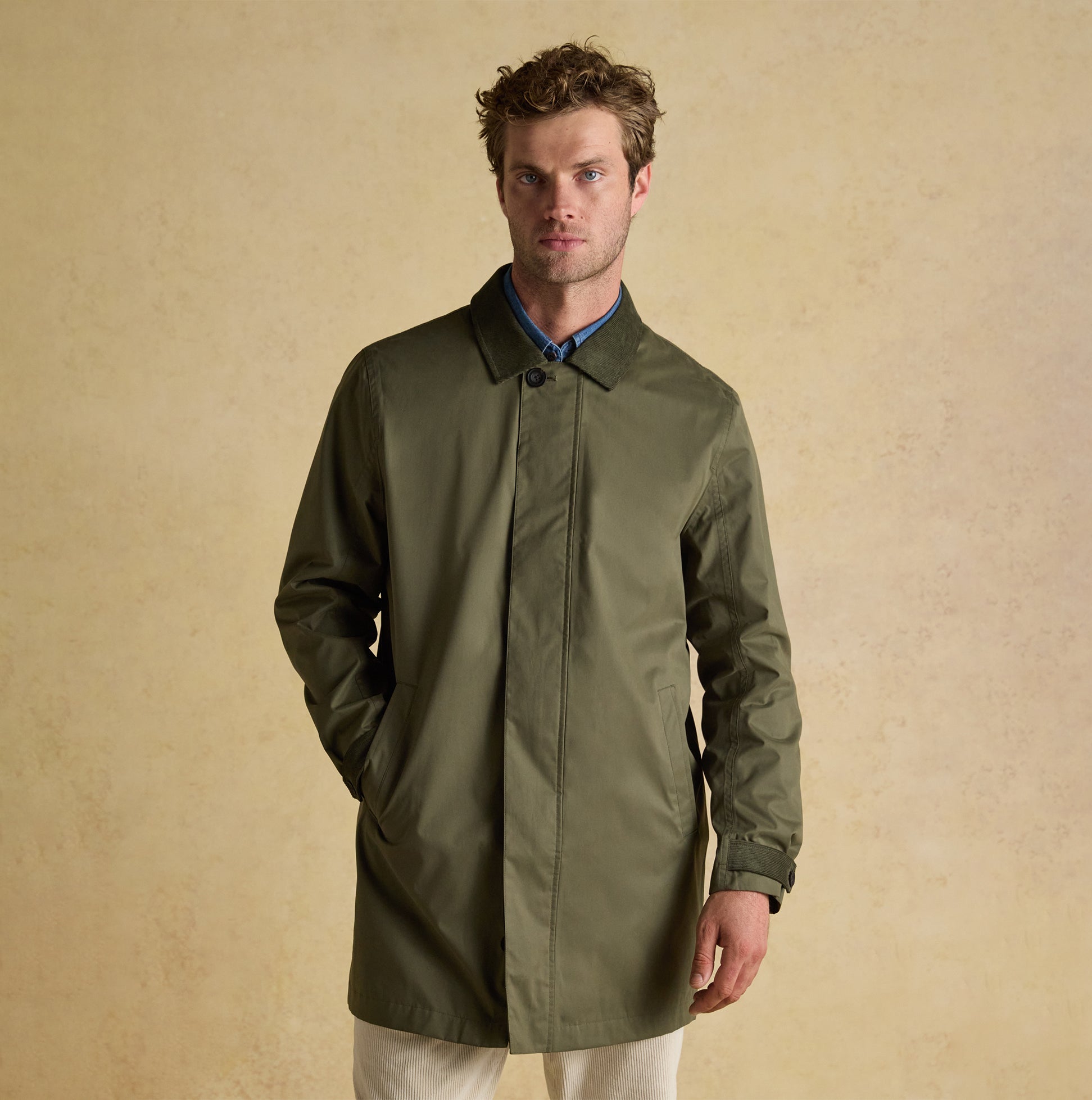 Joules SANDFORD Mens Waterproof Raincoat Green front view with button and zip closure, lightweight and stylish.
