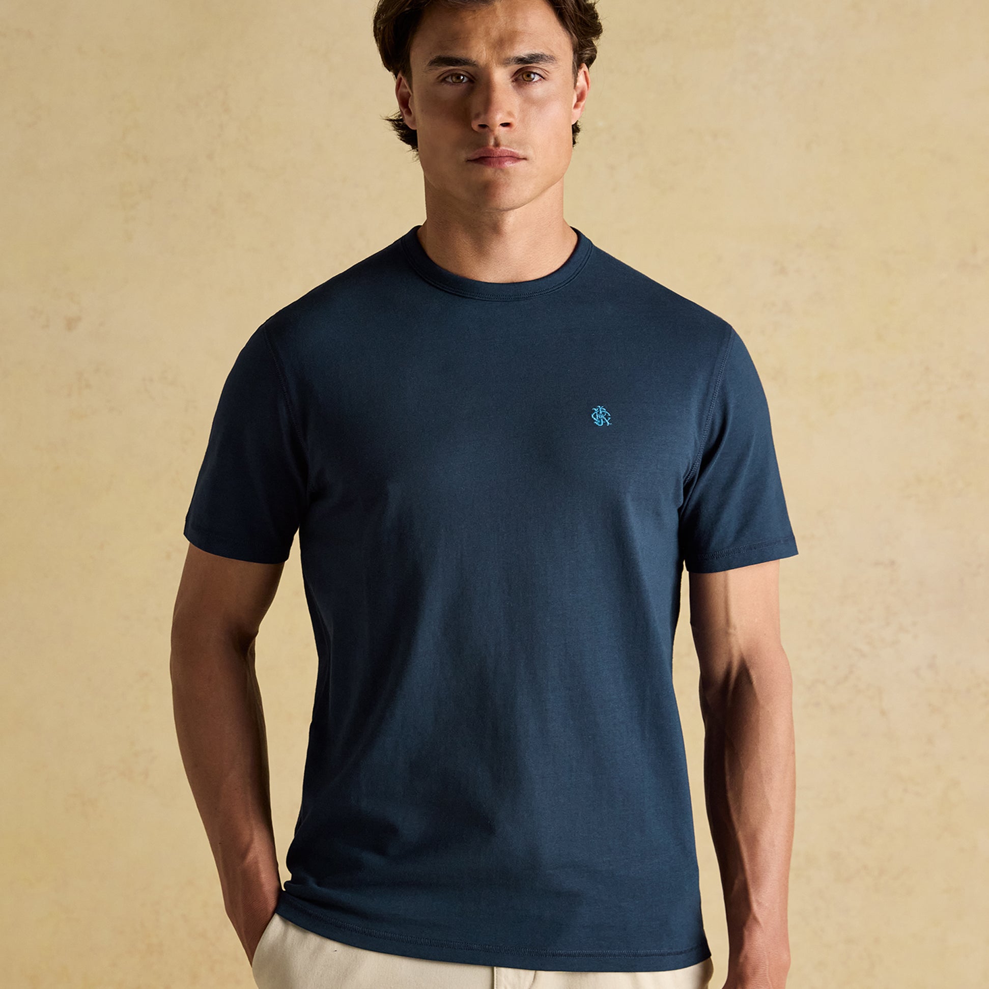 Joules RUGBY CLUB TEE Mens T-Shirt Navy front view, 100% cotton, regular fit, breathable, model wearing.
