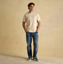 Joules RUGBY CLUB TEE Mens T-Shirt Cream front view worn by model with blue jeans.