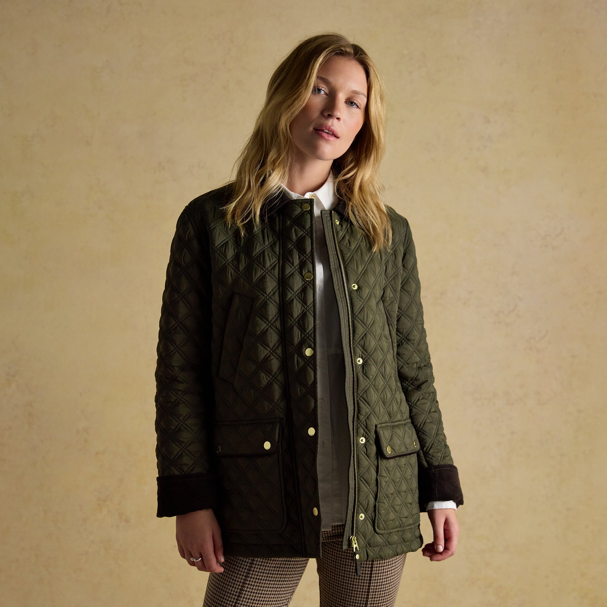 Joules BEATRIX Womens Showerproof Quilted Coat Khaki Green front view with model, featuring button and zip closure.