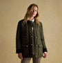 Joules BEATRIX Womens Showerproof Quilted Coat Khaki Green front view with model, featuring button and zip closure.